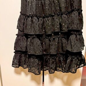 I am selling my pretty little black dress with little sparkles. Never used.